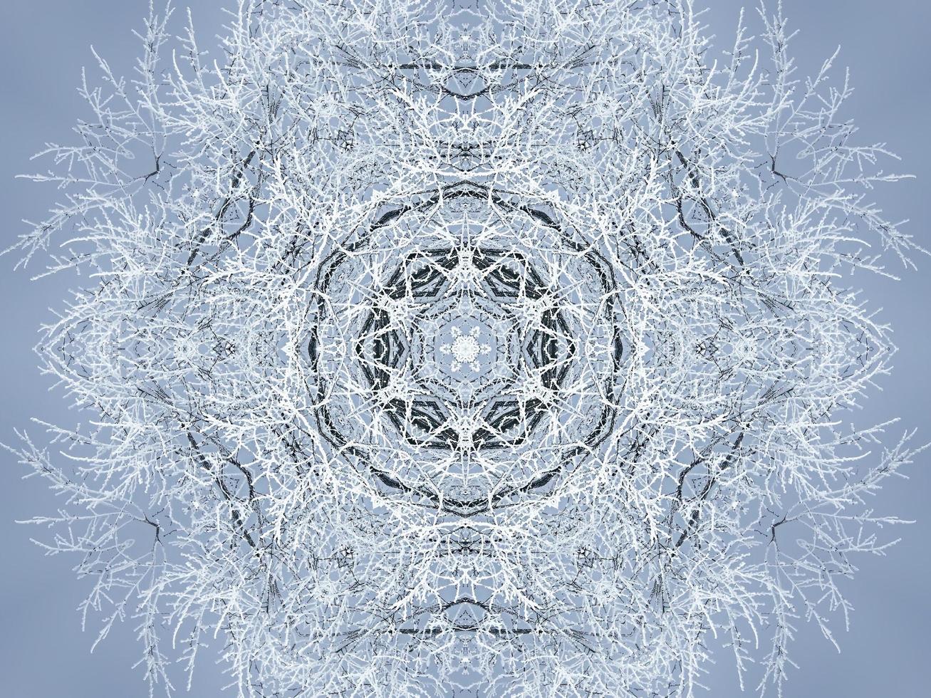 White snow kaleidoscope pattern. Abstract background with winter theme. Free photo. photo