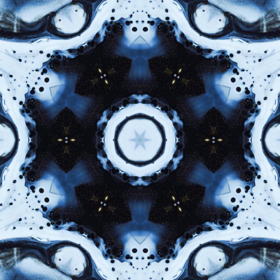Dark reflection abstract background. Kaleidoscope pattern in black and blue color. Free photo. photo