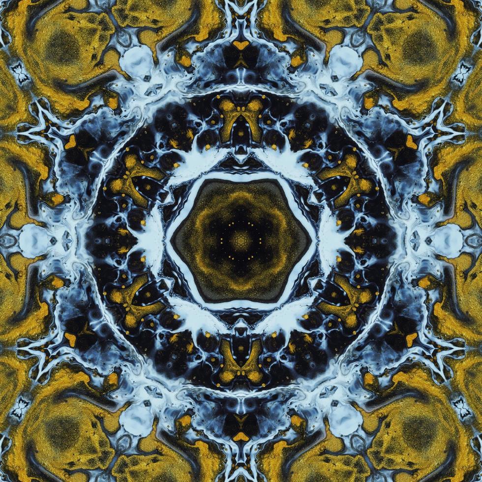 Dark circle abstract background. Kaleidoscope pattern in yellow and blue color. Free Photo