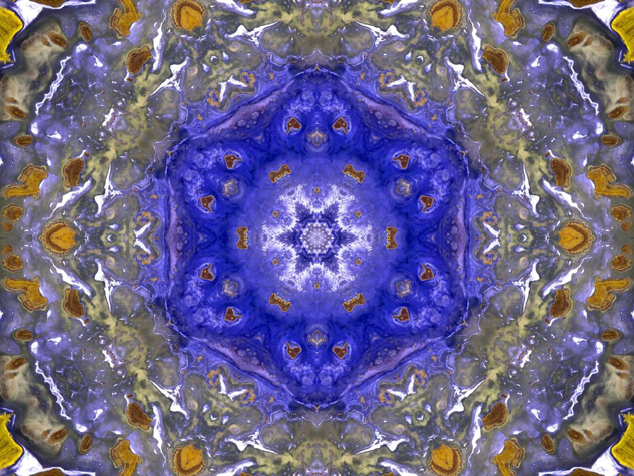 Reflection of colorful flowers in kaleidoscope pattern. Yellow and blue abstract background. Free photo. photo