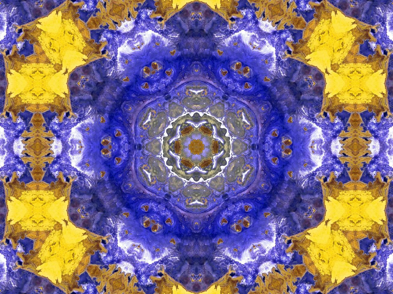 Reflection of colorful flowers in kaleidoscope pattern. Yellow and blue abstract background. Free photo. photo