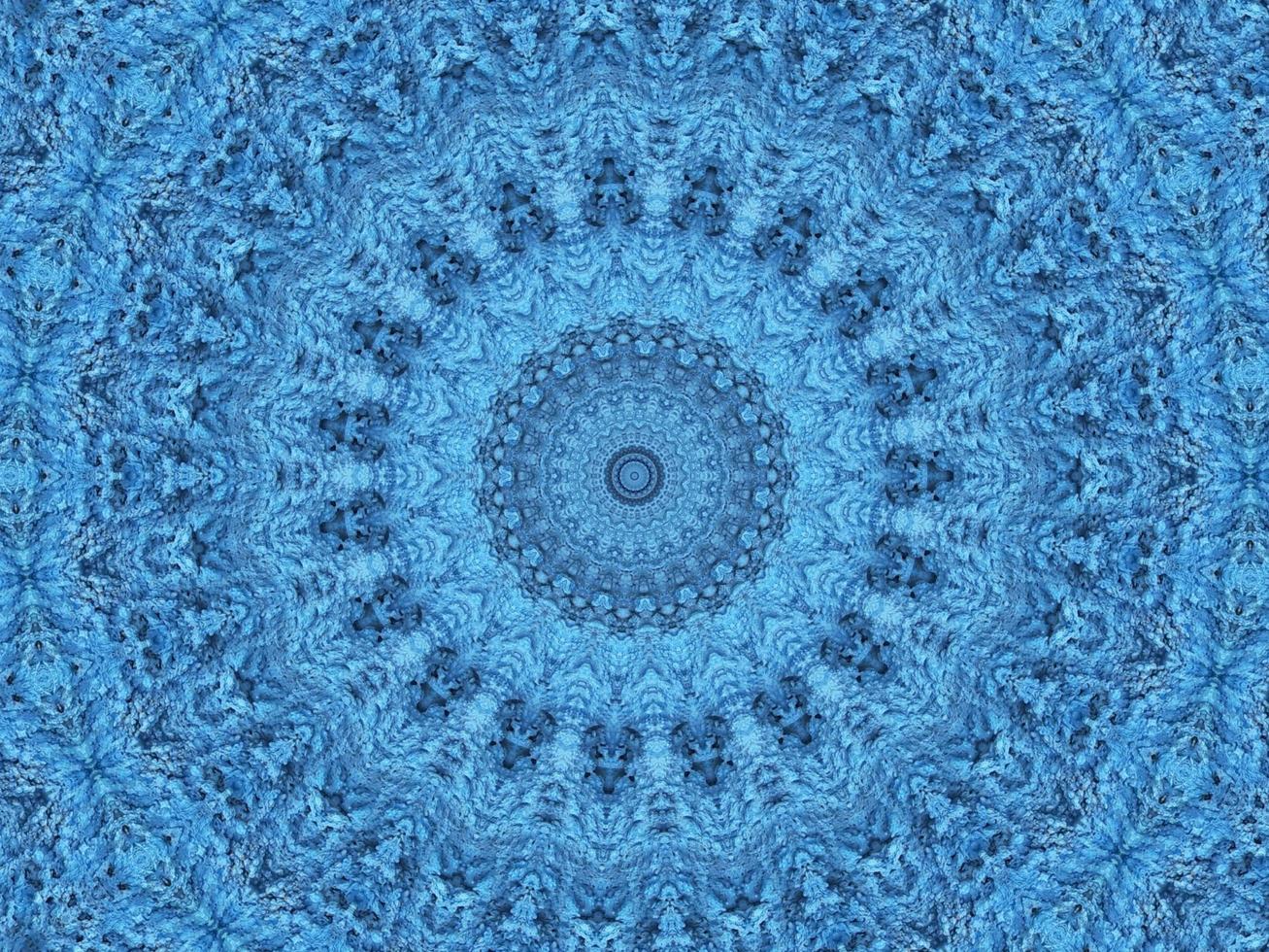 Geometry kaleidoscope pattern. Light blue abstract background. Free photo. photo