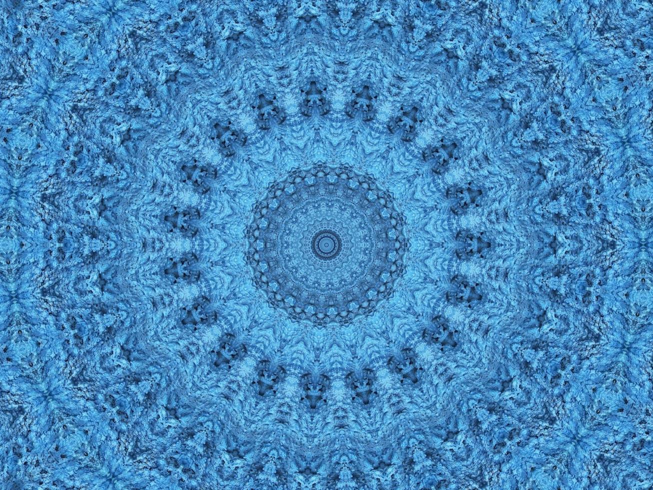 Geometry kaleidoscope pattern. Light blue abstract background. Free photo. photo