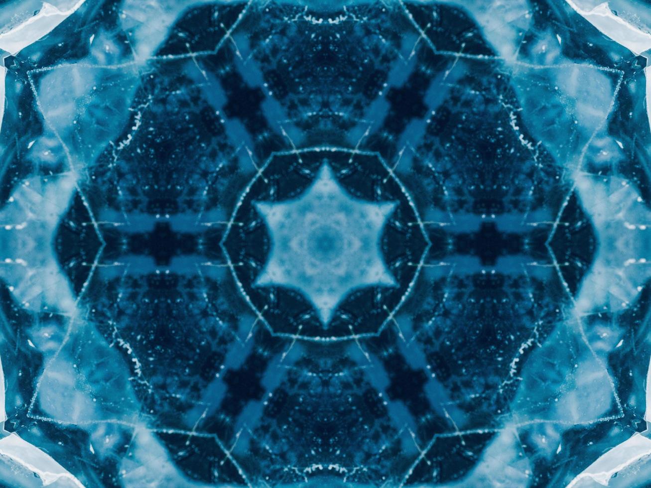 Reflection of deep blue sea in kaleidoscope pattern. Dark blue abstract background. Free photo. photo
