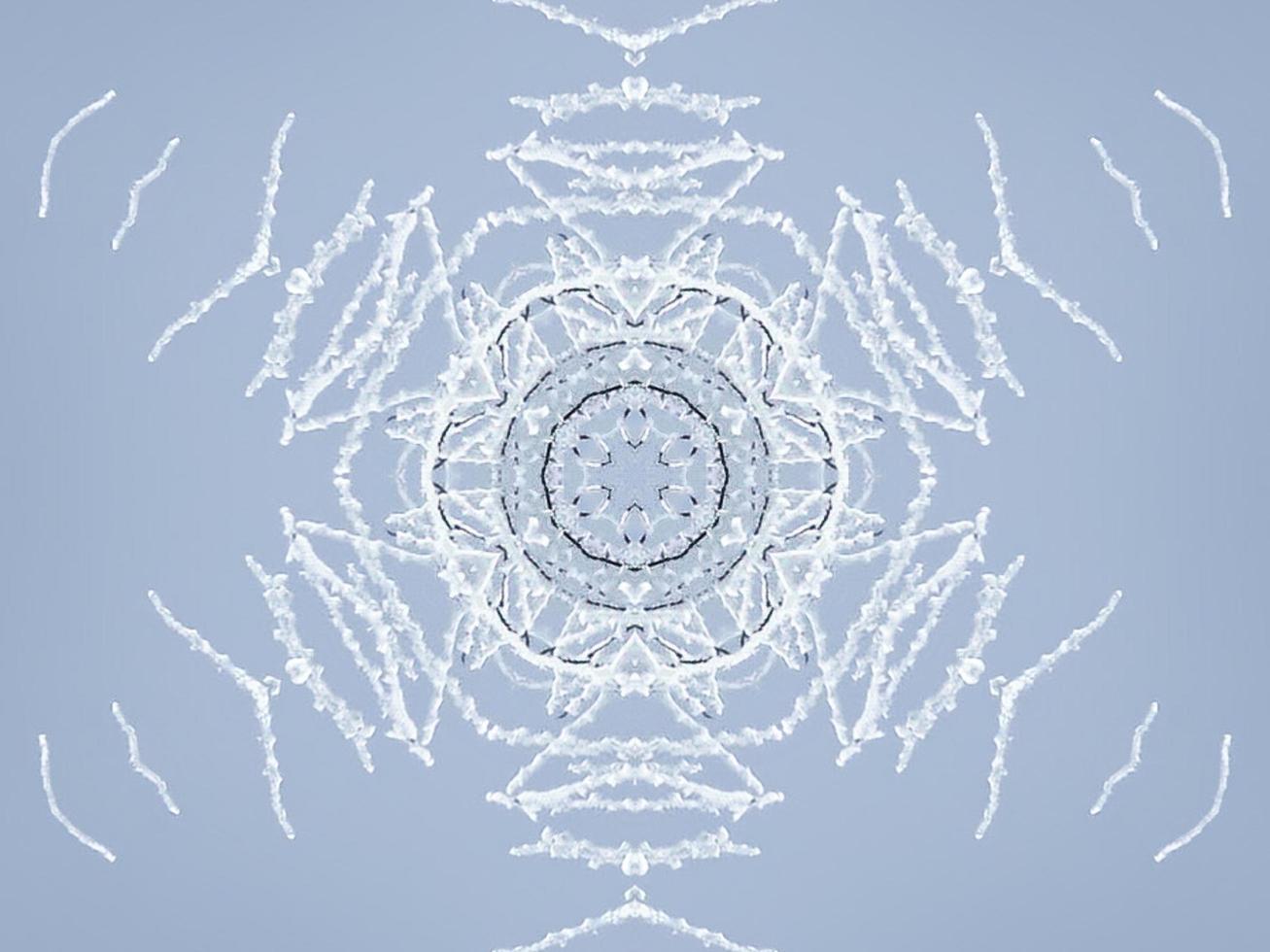 White snow kaleidoscope pattern. Abstract background with winter theme. Free photo. photo