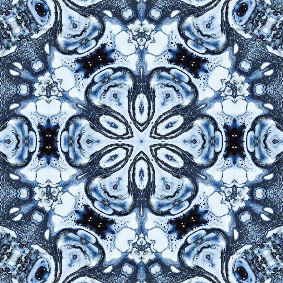 Dark reflection abstract background. Kaleidoscope pattern in black and blue color. Free photo. photo