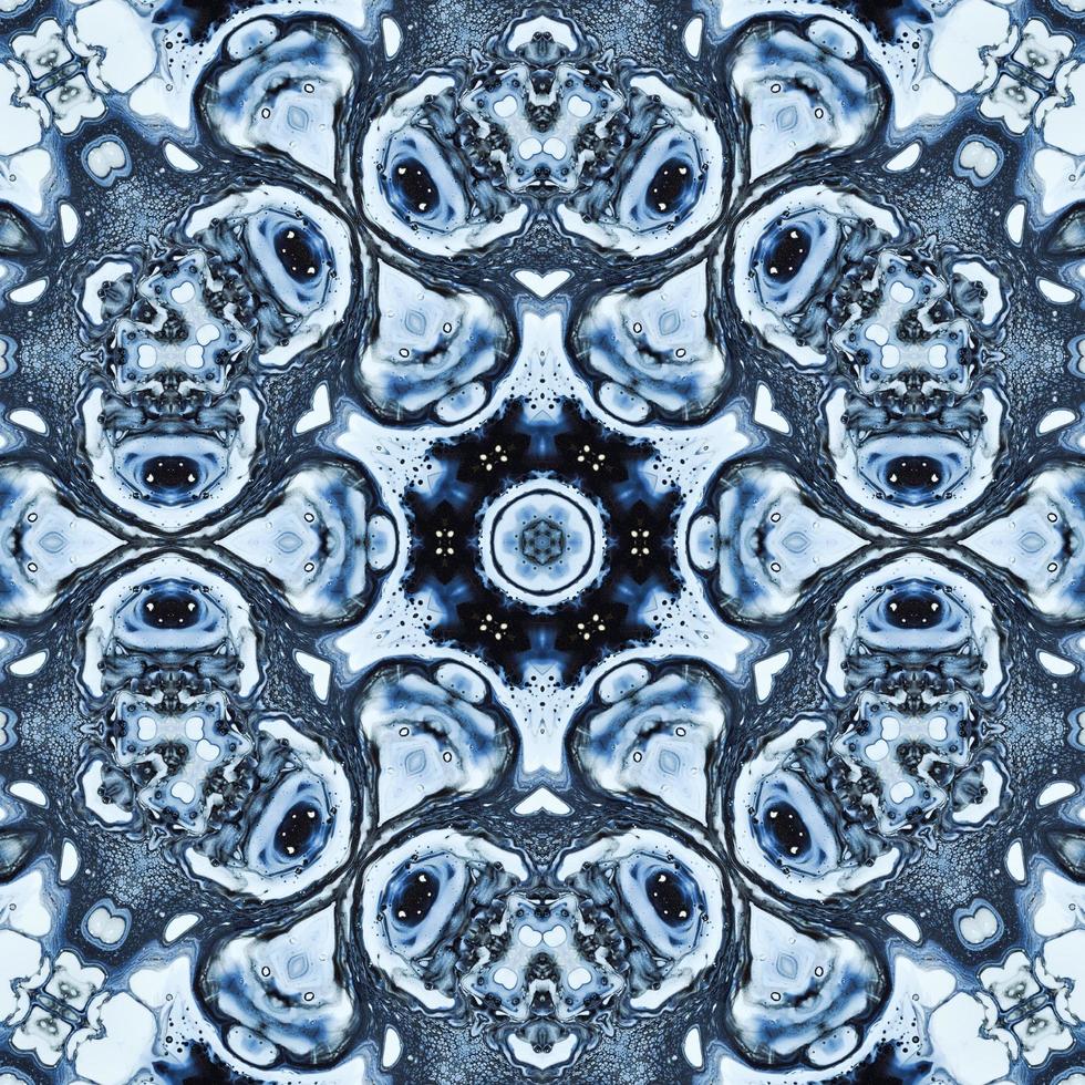 Dark reflection abstract background. Kaleidoscope pattern in black and blue color. Free photo. photo
