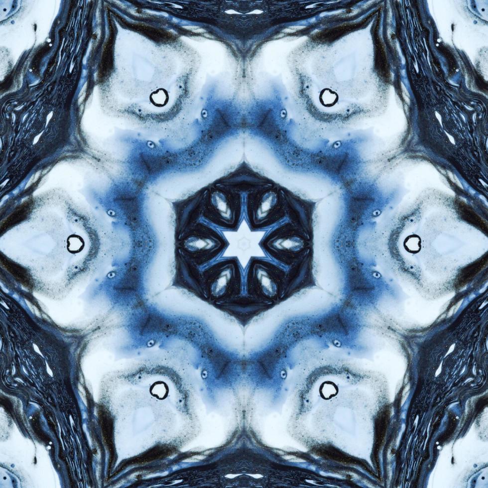 Dark reflection abstract background. Kaleidoscope pattern in black and blue color. Free photo. photo