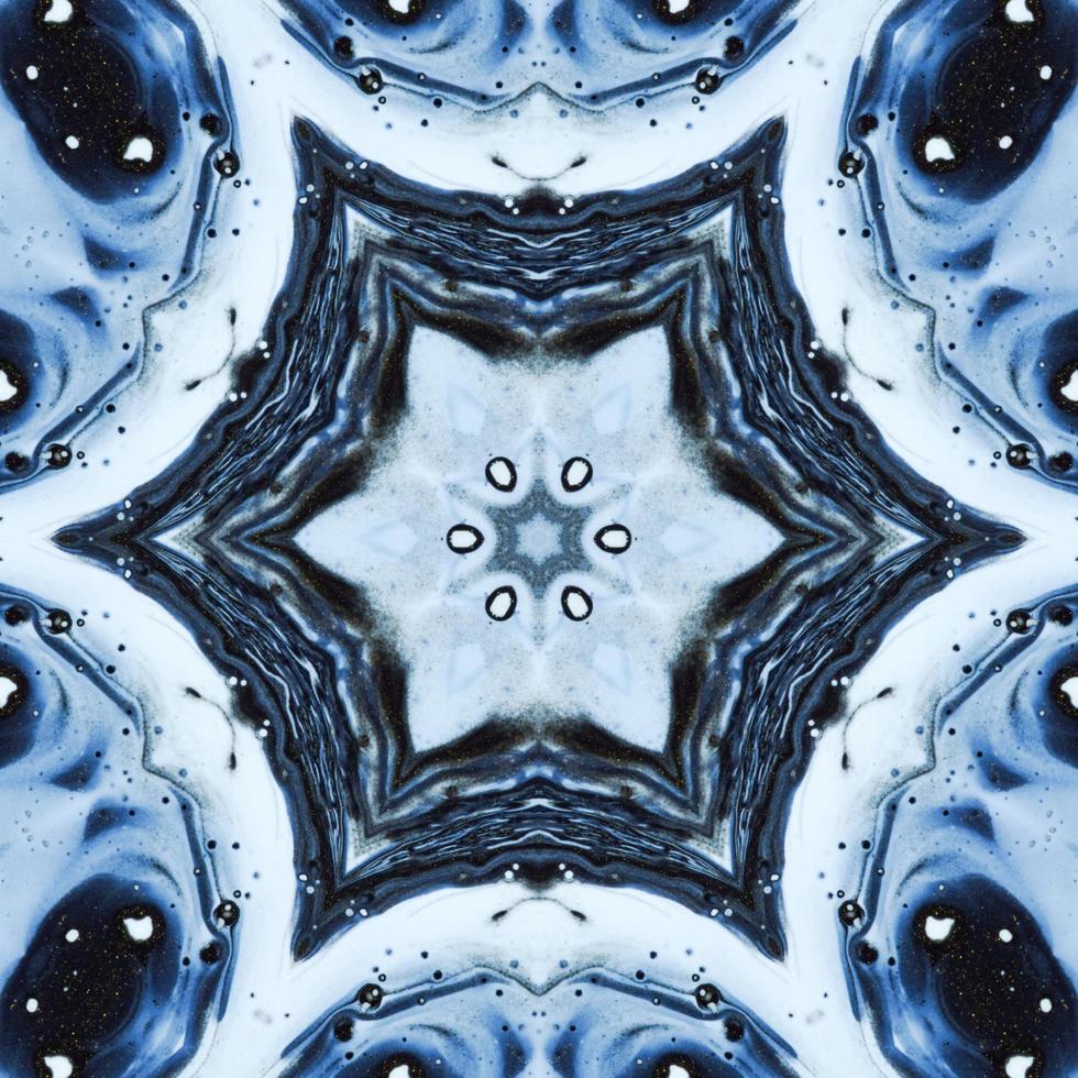 Dark reflection abstract background. Kaleidoscope pattern in black and blue color. Free photo. photo