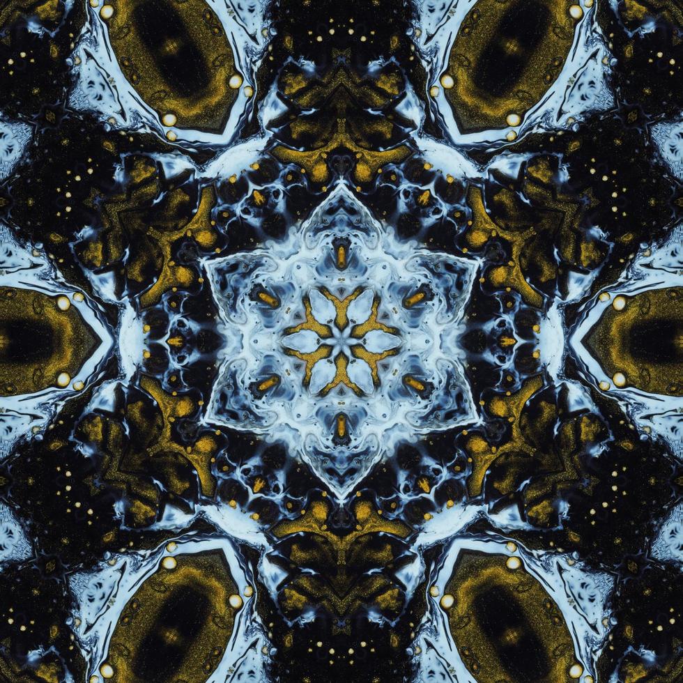 Dark circle abstract background. Kaleidoscope pattern in yellow and blue color. Free Photo