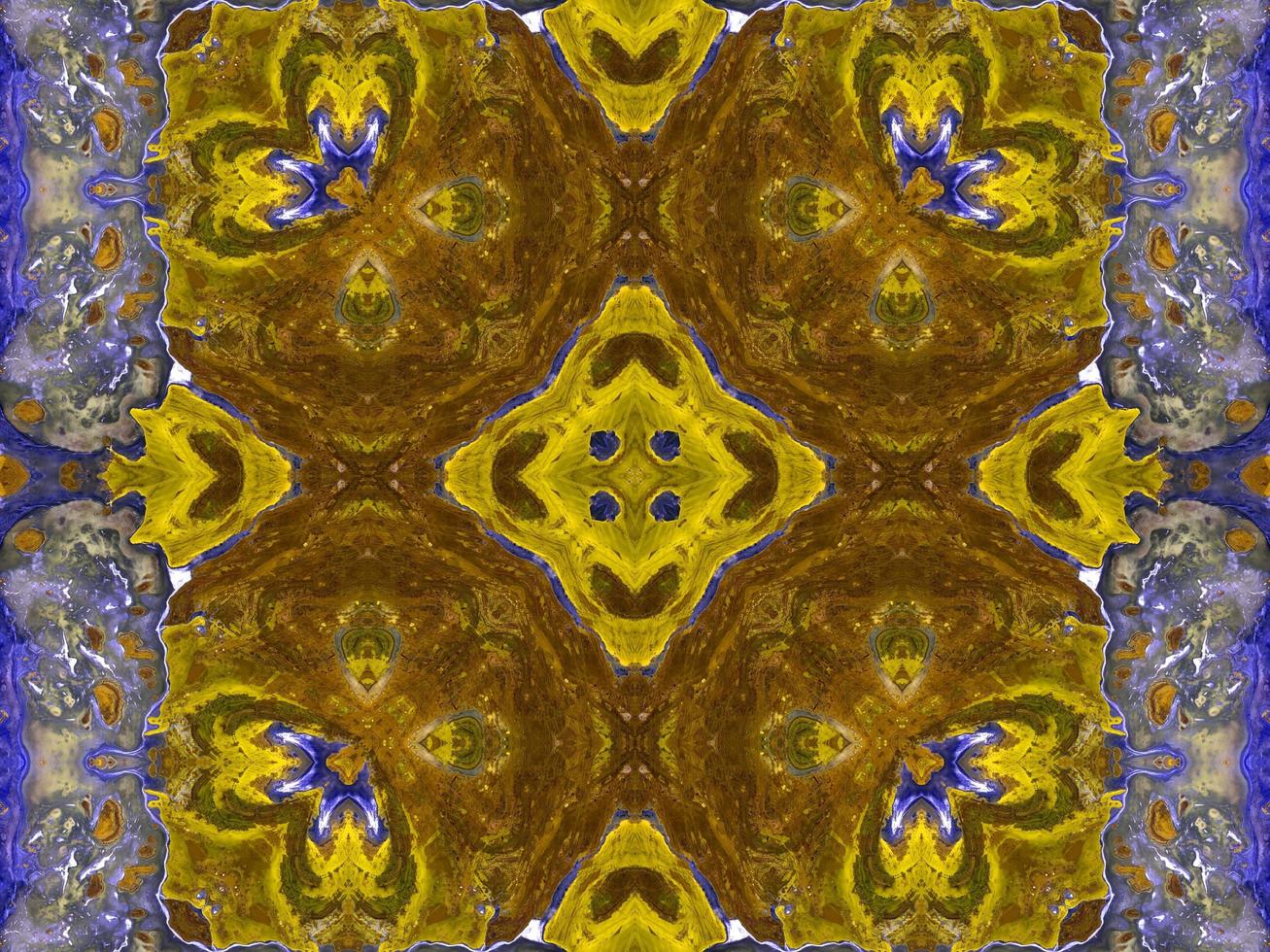 Reflection of colorful flowers in kaleidoscope pattern. Yellow and blue abstract background. Free photo. photo