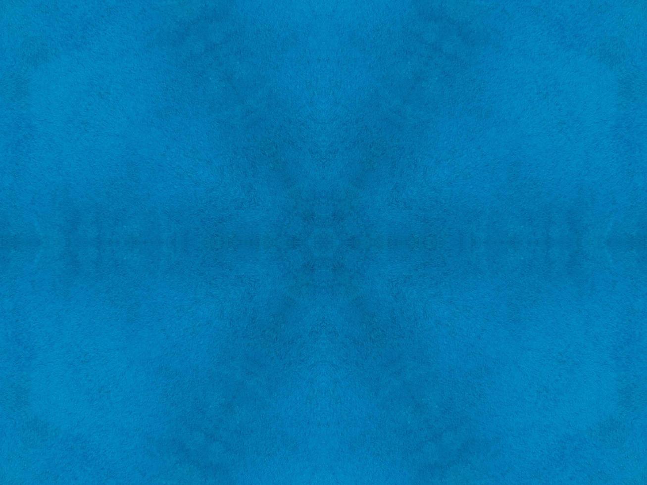Plain blue kaleidoscope pattern. Abstract background. Free photo. photo