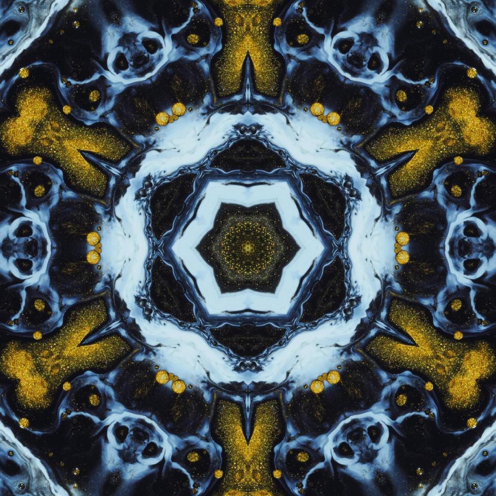 Dark circle abstract background. Kaleidoscope pattern in yellow and blue color. Free Photo