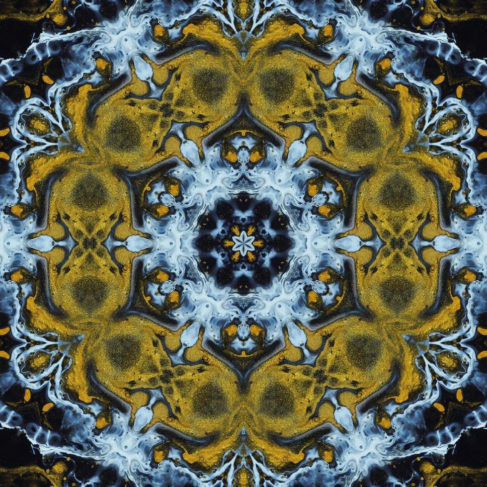 Dark circle abstract background. Kaleidoscope pattern in yellow and blue color. Free Photo