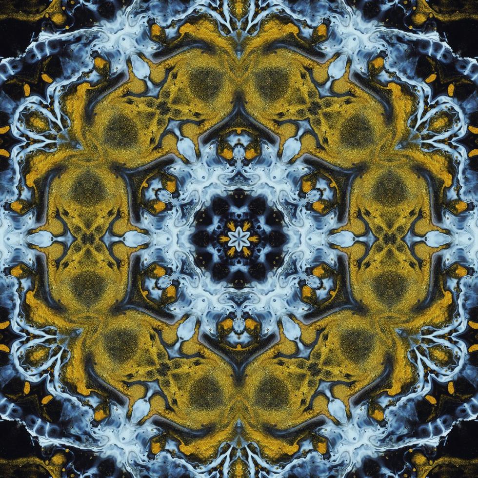 Dark circle abstract background. Kaleidoscope pattern in yellow and blue color. Free Photo