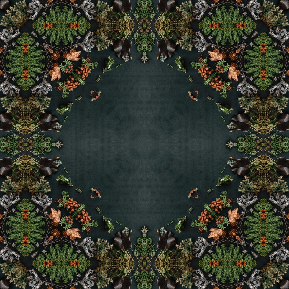 Dark green abstract rectangular background. Spruce kaleidoscope pattern. Free background. photo