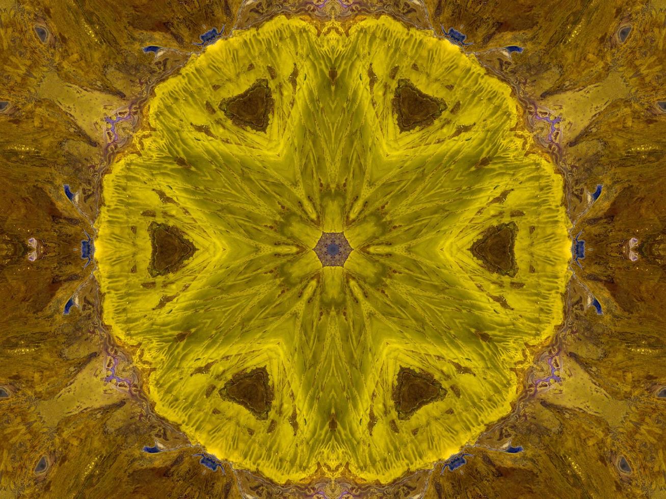 Reflection of colorful flowers in kaleidoscope pattern. Yellow and blue abstract background. Free photo. photo