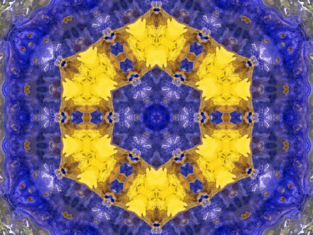 Reflection of colorful flowers in kaleidoscope pattern. Yellow and blue abstract background. Free photo. photo