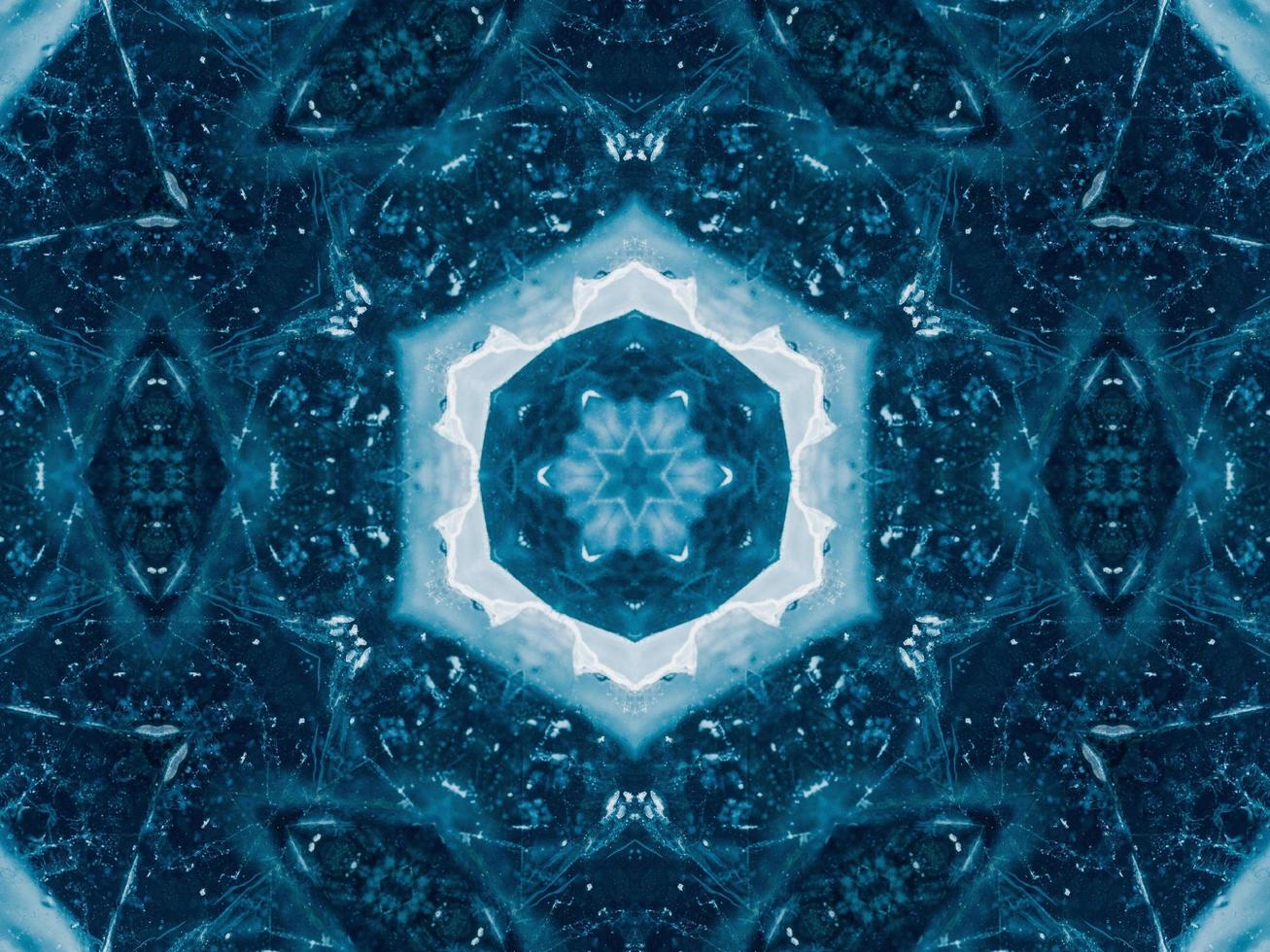 Reflection of deep blue sea in kaleidoscope pattern. Dark blue abstract background. Free photo. photo