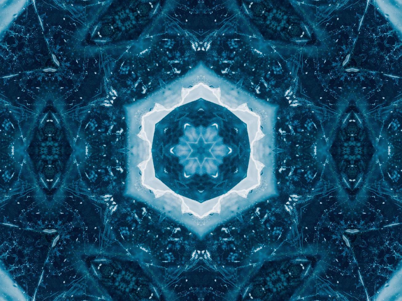 Reflection of deep blue sea in kaleidoscope pattern. Dark blue abstract background. Free photo. photo