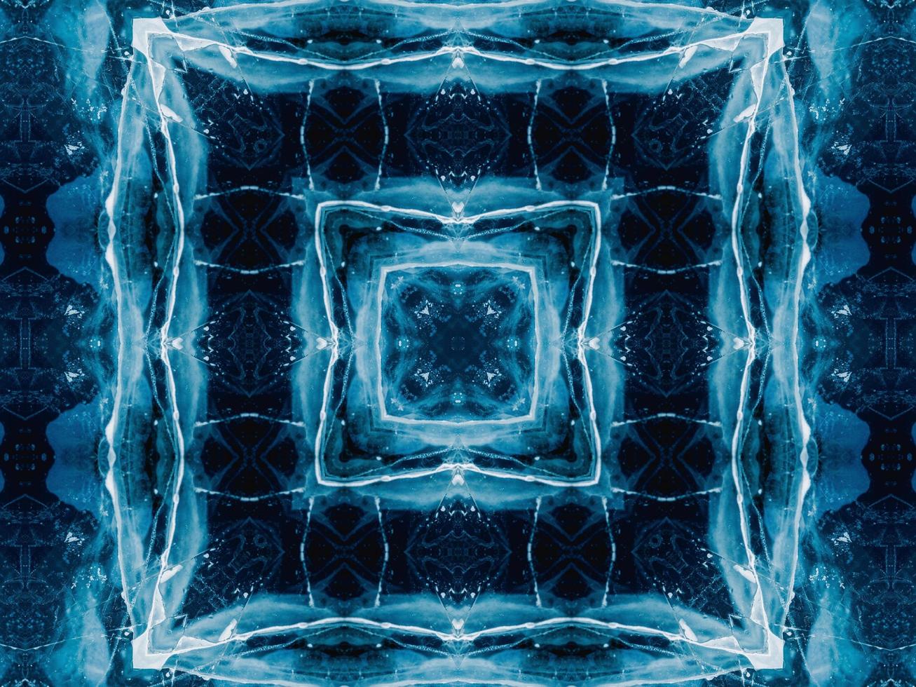 Reflection of deep blue sea in kaleidoscope pattern. Dark blue abstract background. Free photo. photo