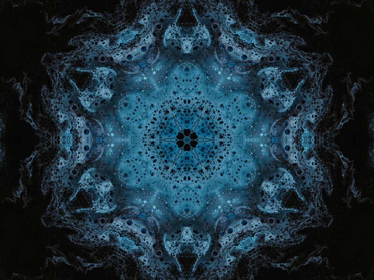 Reflection of colorful flowers kaleidoscope pattern. Abstract background. Free photo. photo