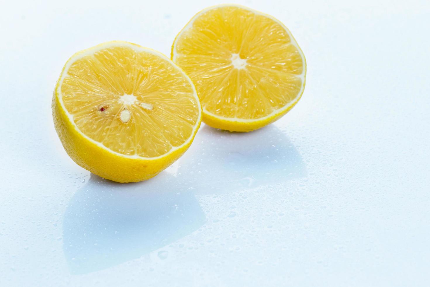 Fresh lemon on white background photo