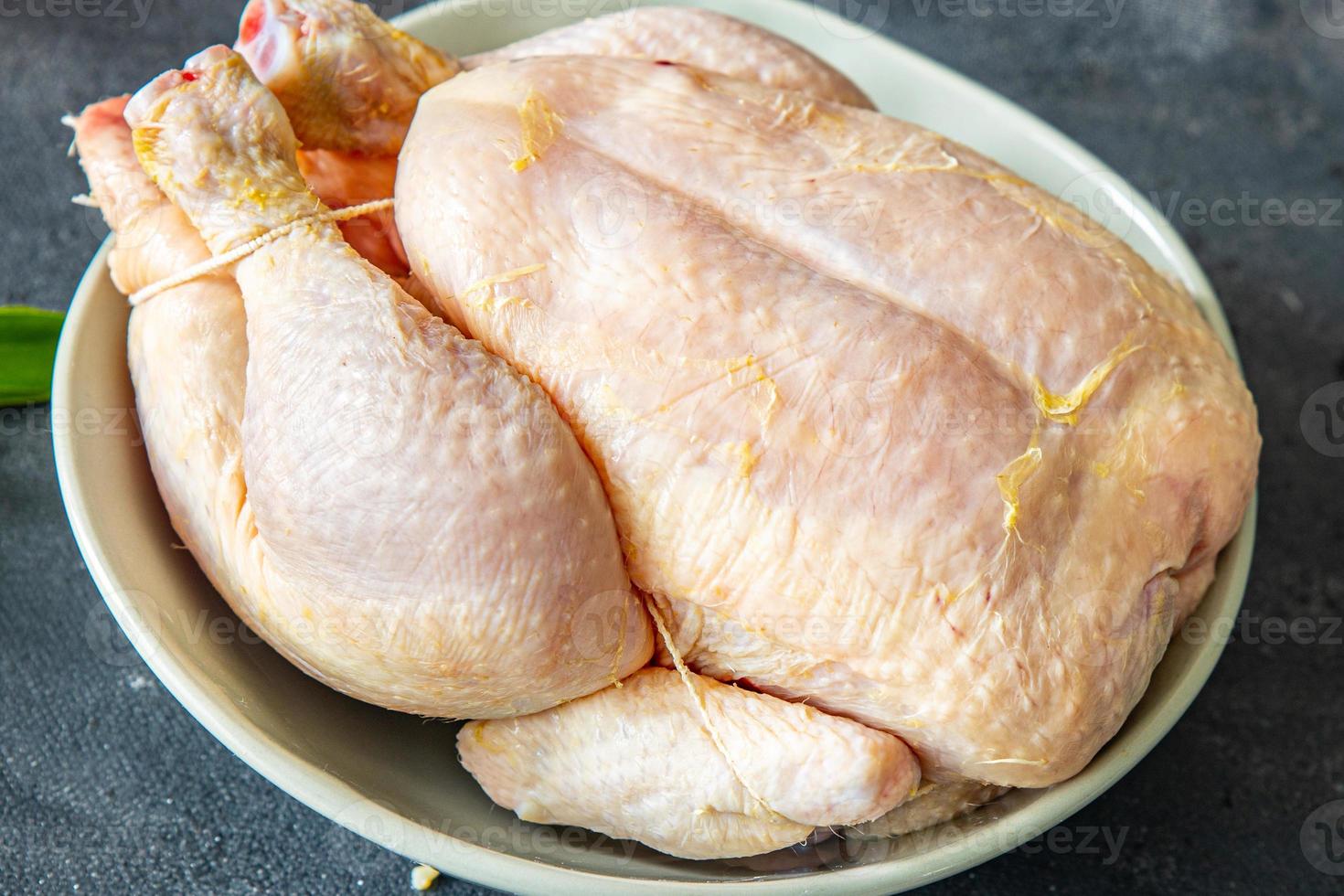 carne de pollo entera aves de corral pollo de engorde comida saludable fresca comida merienda dieta en la mesa espacio de copia comida foto