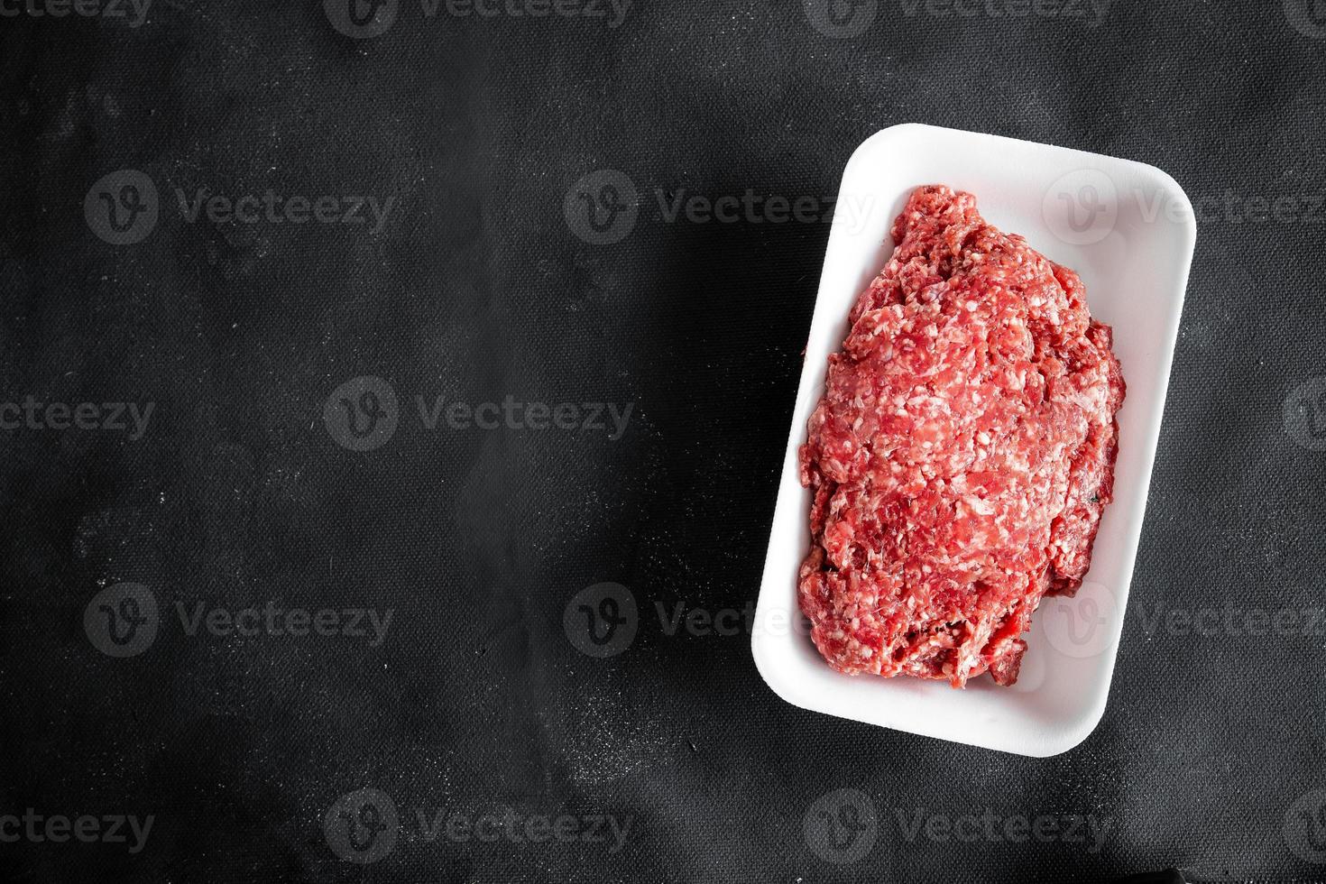 minced meat fresh beef, pork, lamb, chicken healthy meal food snack diet on the table copy space food background rustic top view keto or paleo diet photo