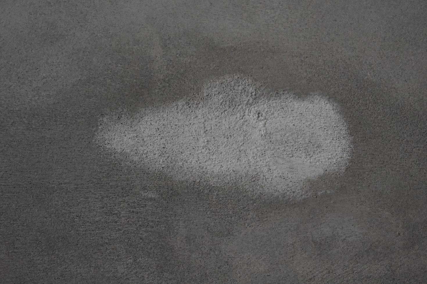 Cement Wall with White Spot Background Texture photo