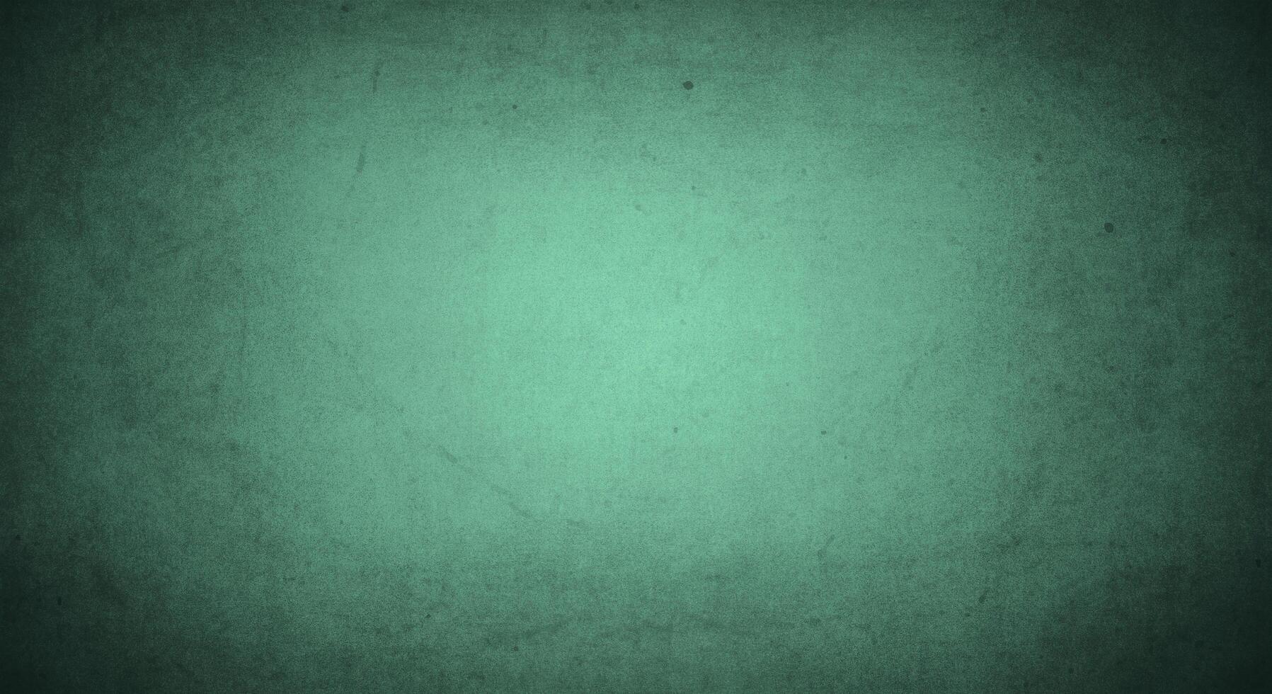 dark green grunge background with soft lightand dark border, old vintage background photo