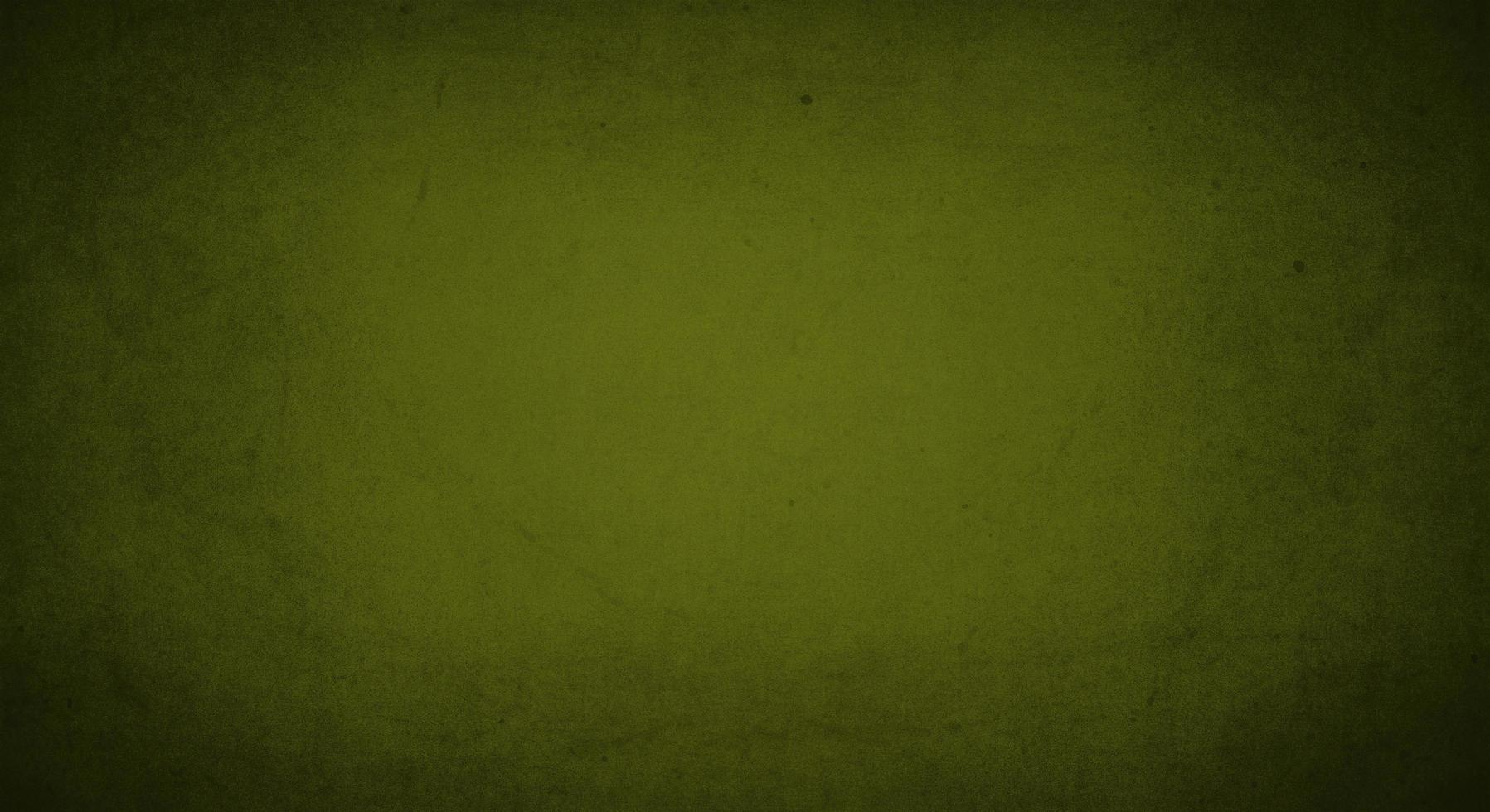 green army grunge background with soft lightand dark border, old vintage background photo