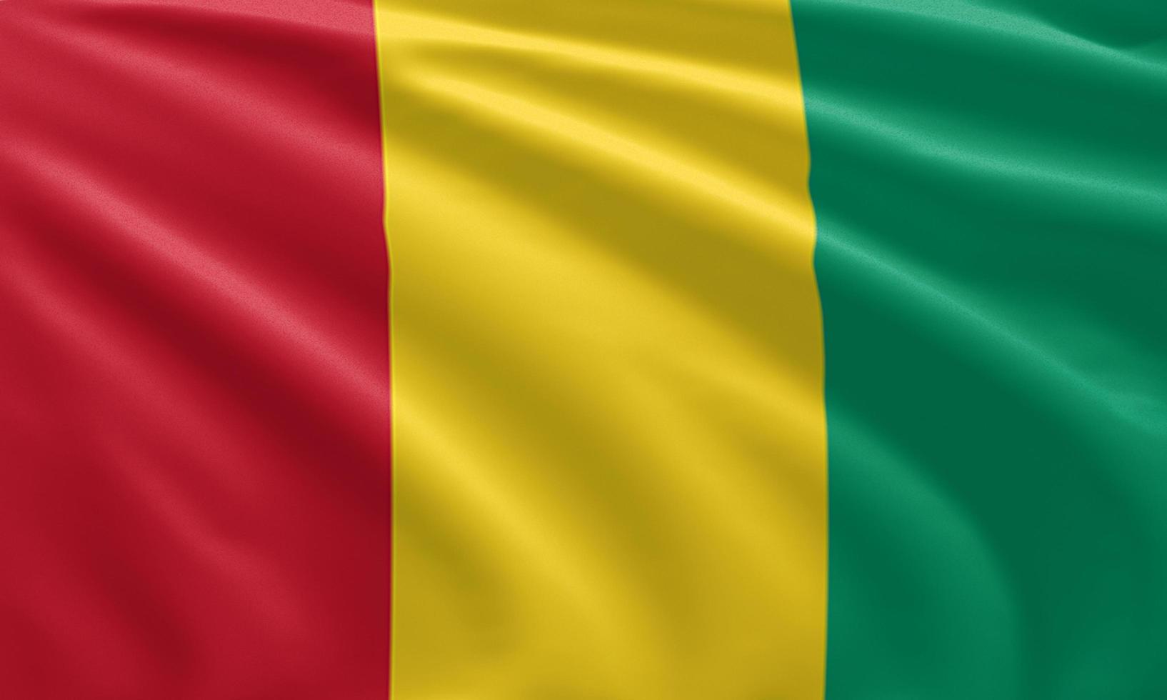 close up waving flag of Guinea photo