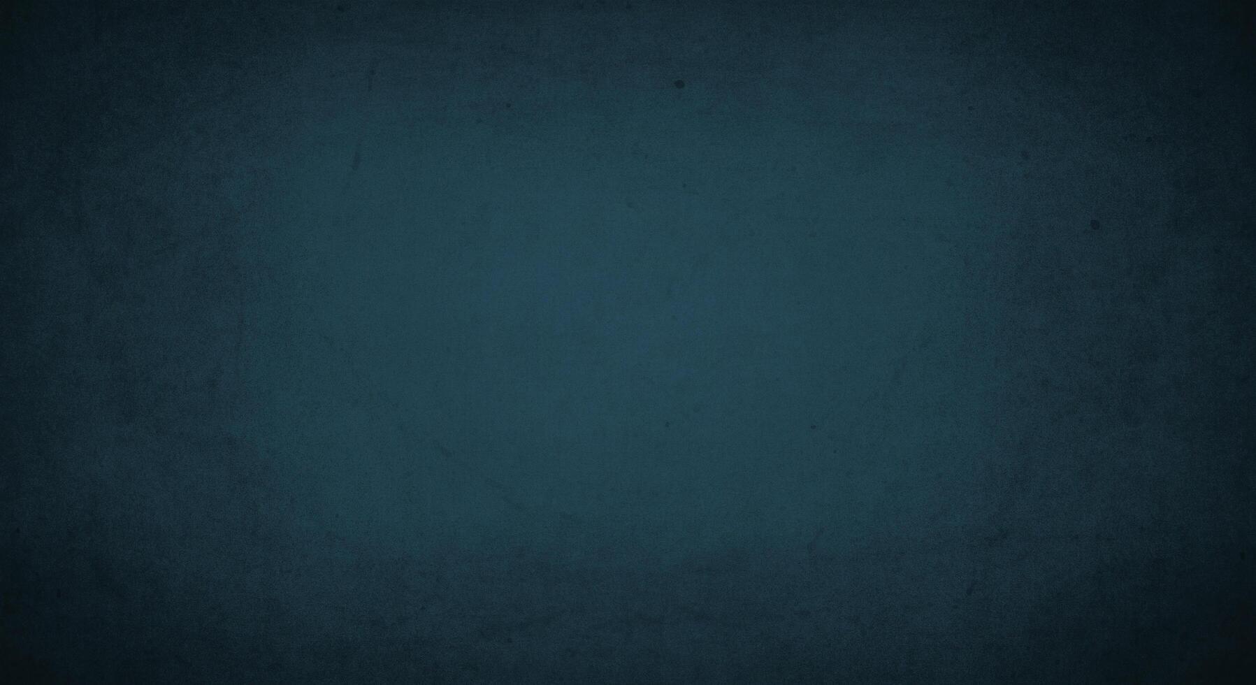 dark blue grunge background with soft lightand dark border, old vintage background photo