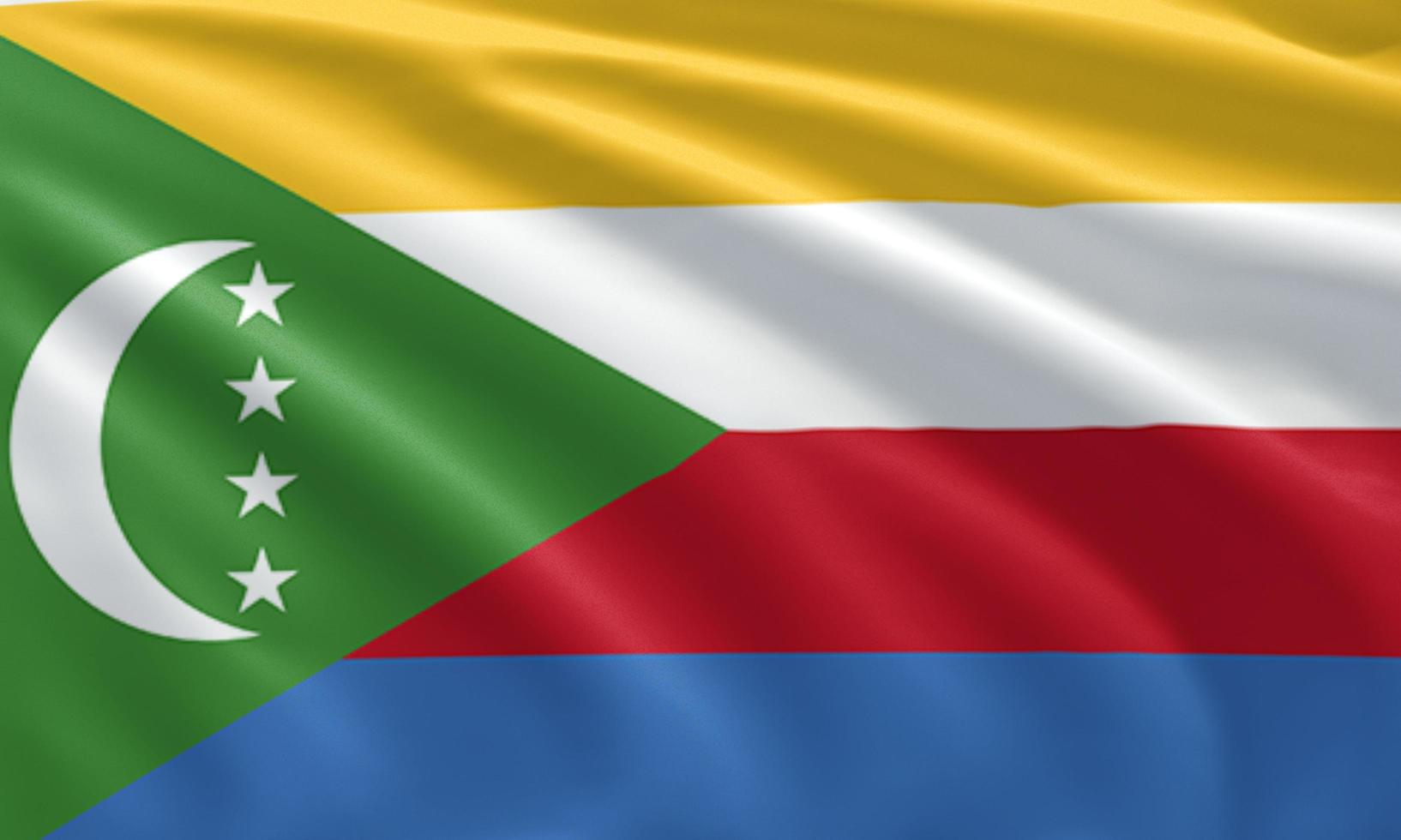 close up waving flag of Comoros photo