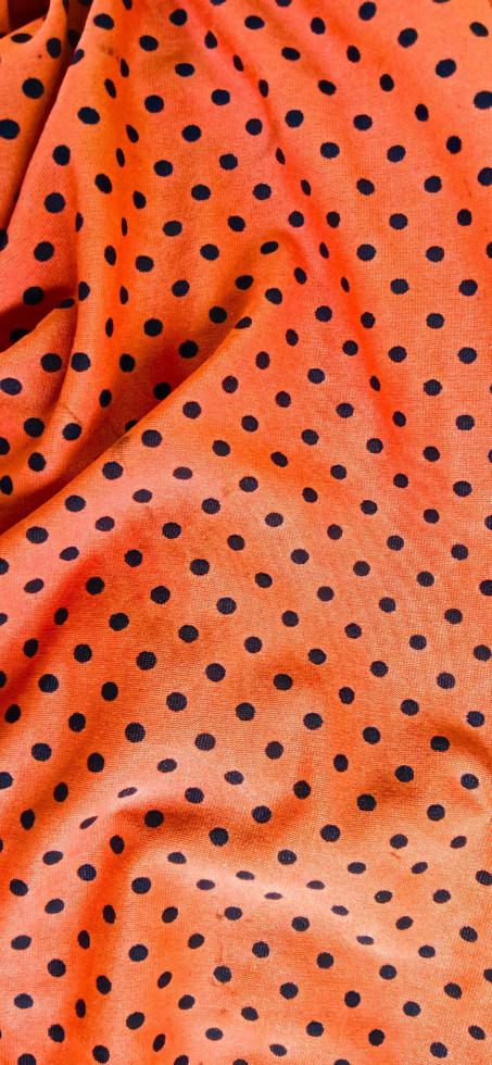 3D wave photo effects created from red orange polka dot pattern fabric