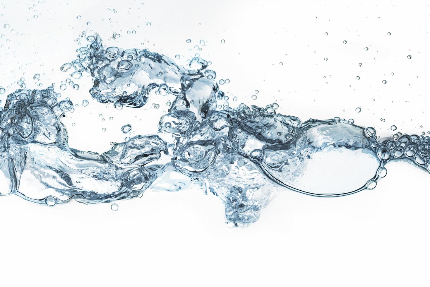 water wave and bubbles on white background photo