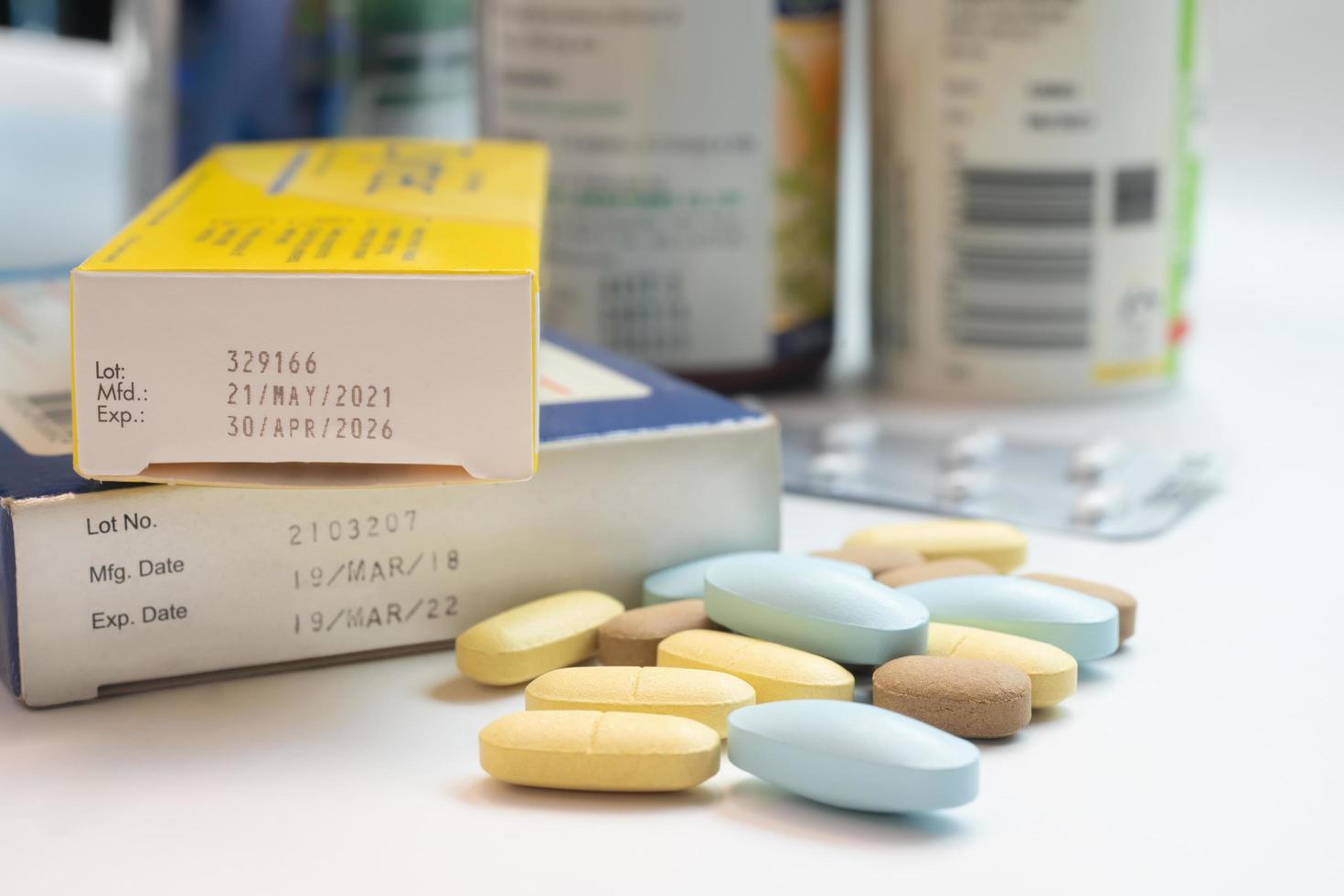 Drug expiration dates ,Expiry date on old packet of medication.medicine and health care concept ,selective focus photo
