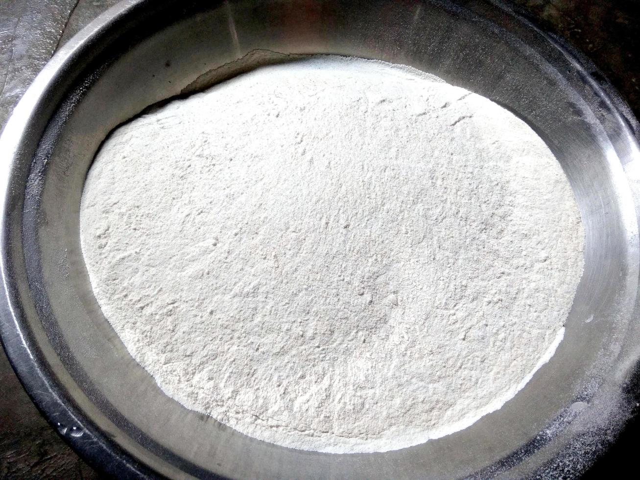 close up for wheat flour in plate photo