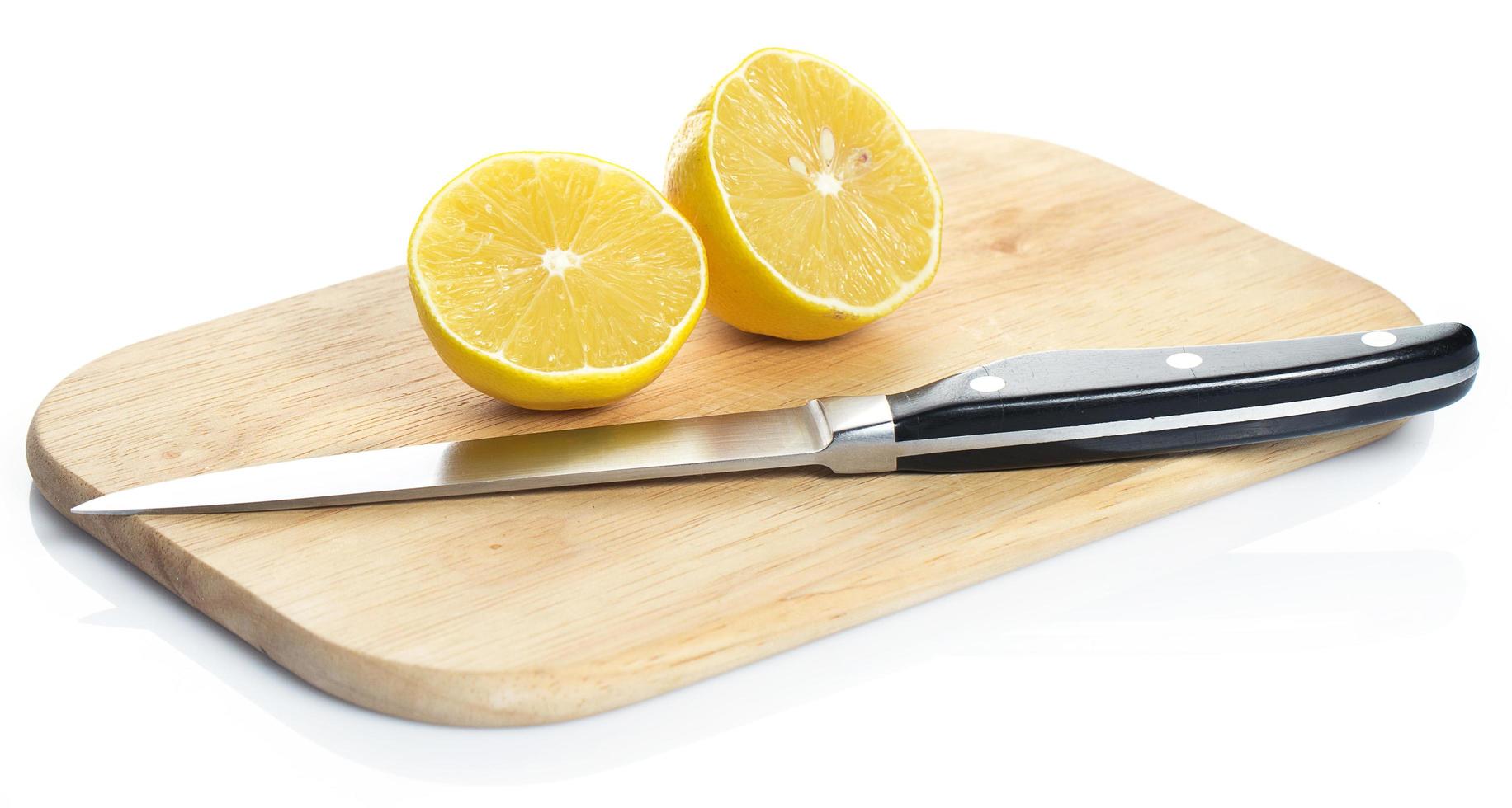 Lemon over chopping board photo