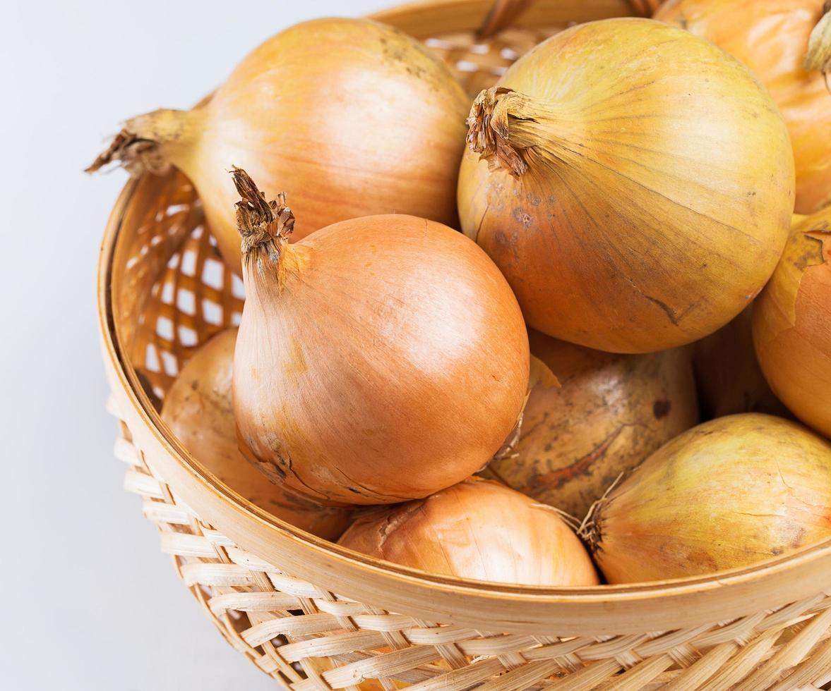 Fresh onion in basket photo