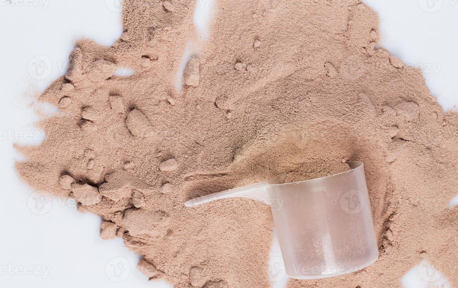 Protein powder and scoop photo