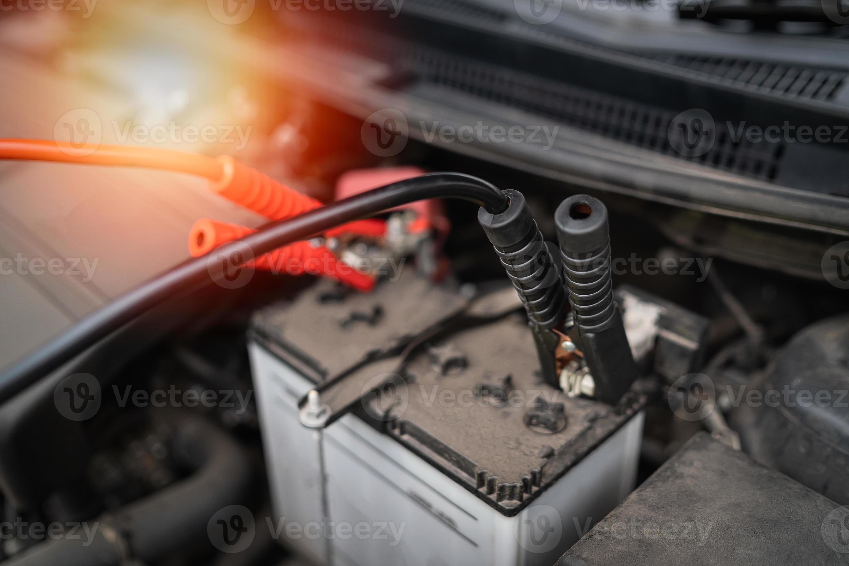 Car battery jump cable for car battery is dead. car battery charger The car battery is exhausted