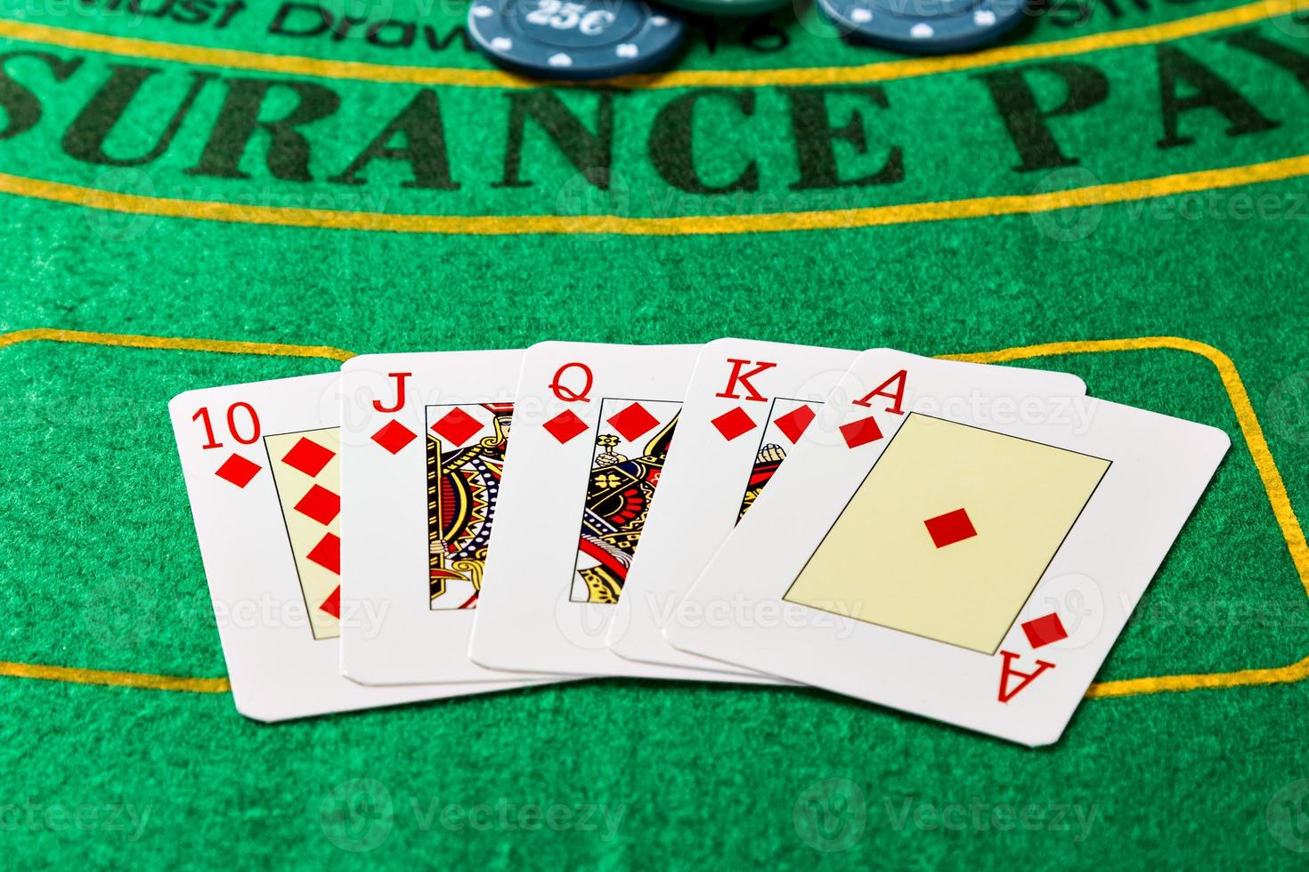 Royal Straight Flush with poker chips. Horizontal image. photo