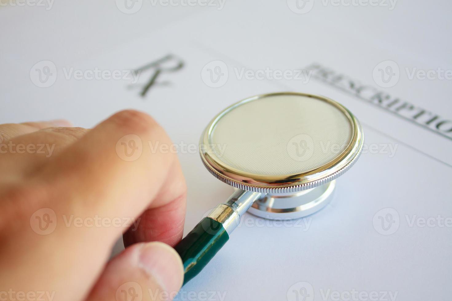 Blank medical prescription with stethoscope photo