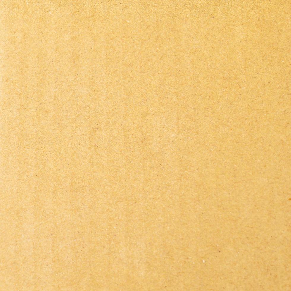 The texture of the cardboard is brown, used as a background. photo