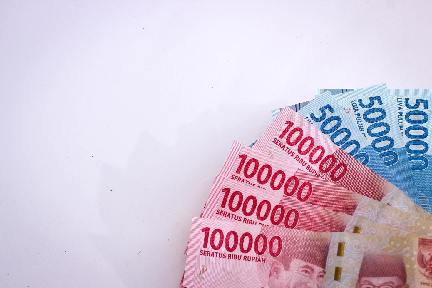 Some rupiah money with white background photo