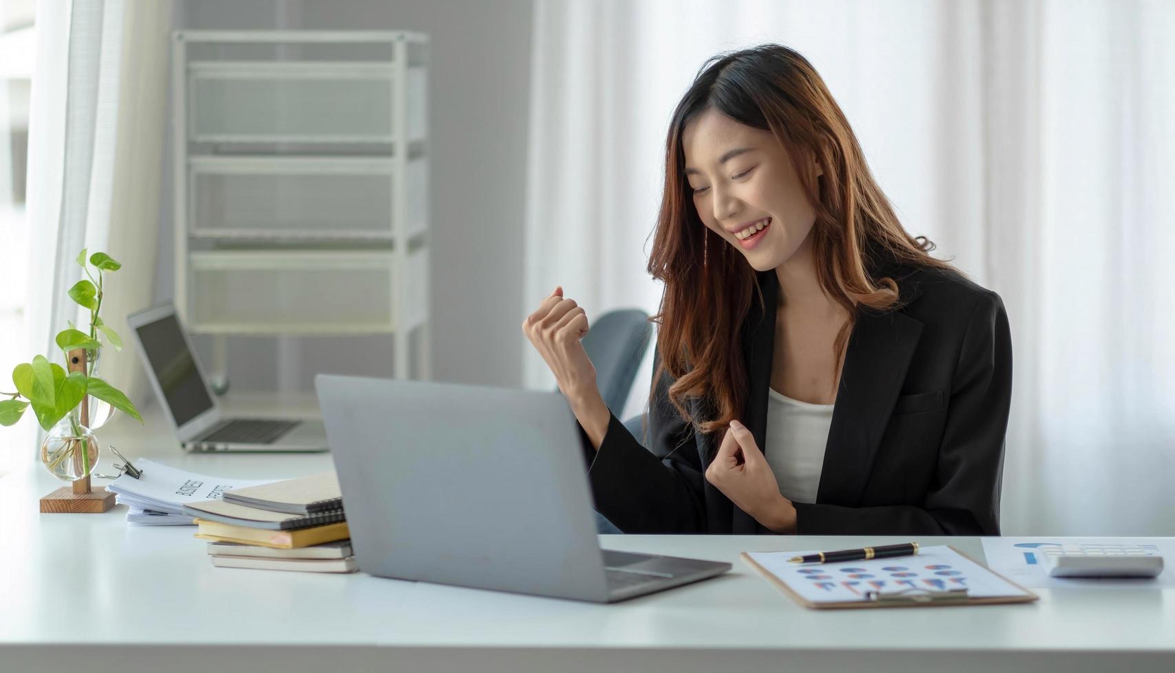 Portrait of smile beautiful business asian woman suit working office desk computer. Small business sme people employee freelance online start up marketing designer telemarket successful banner photo