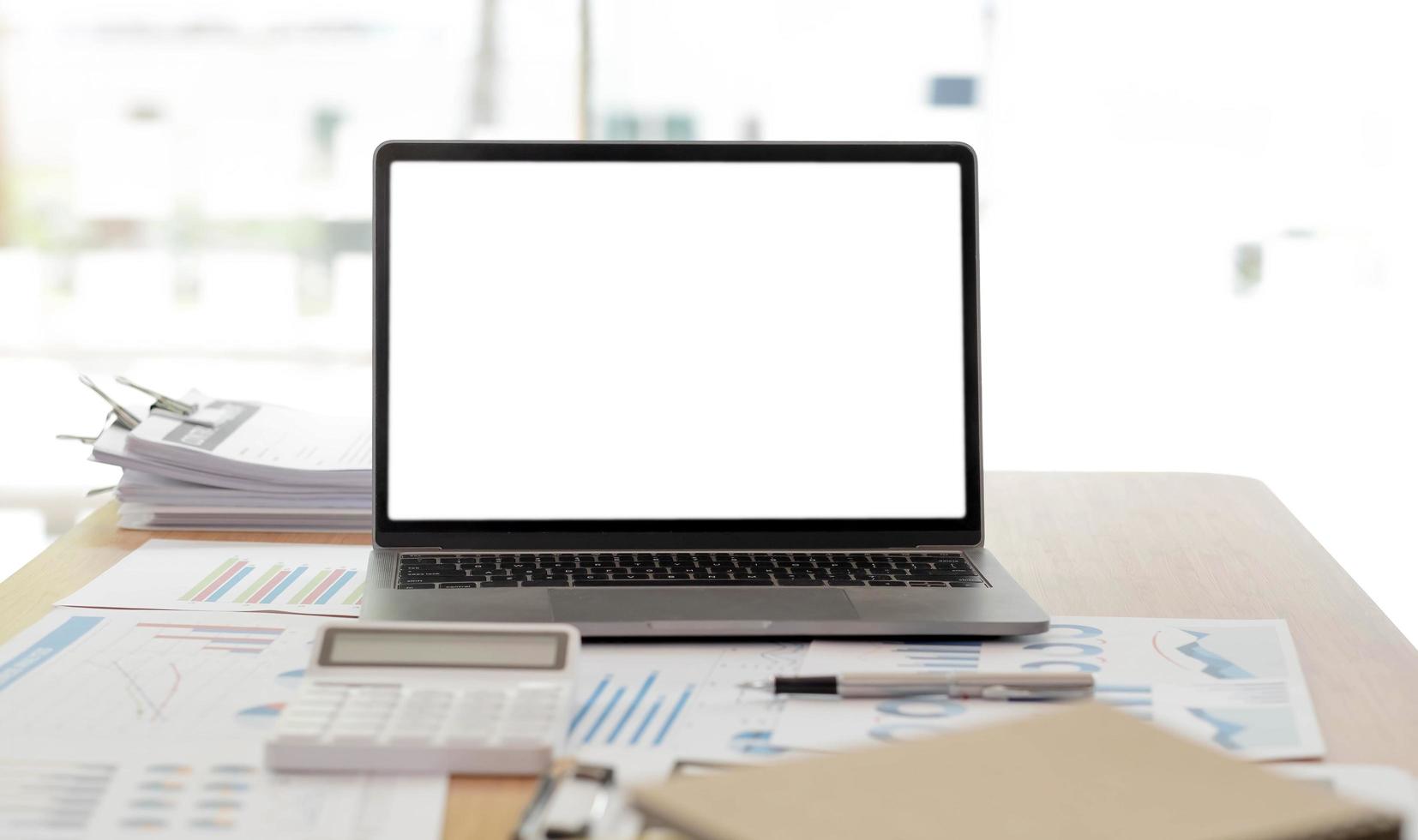 Laptop or notebook with blank screen on the floor service counter in the office. photo