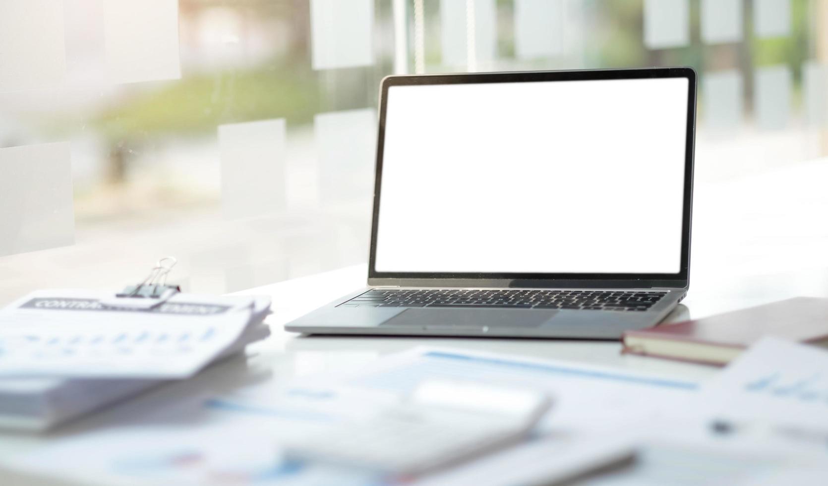 Laptop or notebook with blank screen on the floor service counter in the office. photo